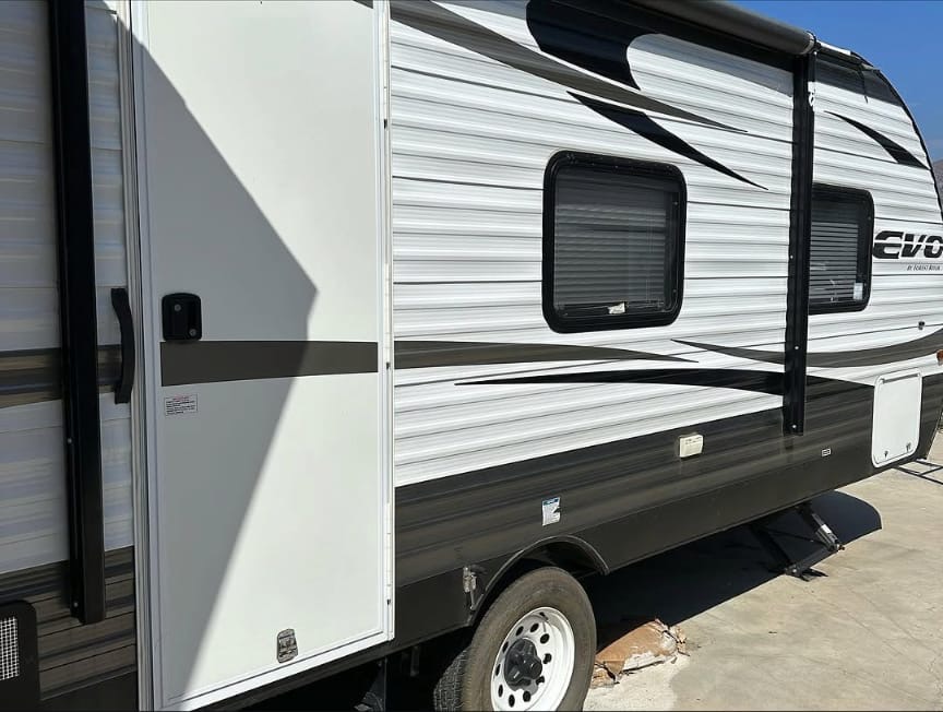Forest River EVO travel trailer door and windows after detailing