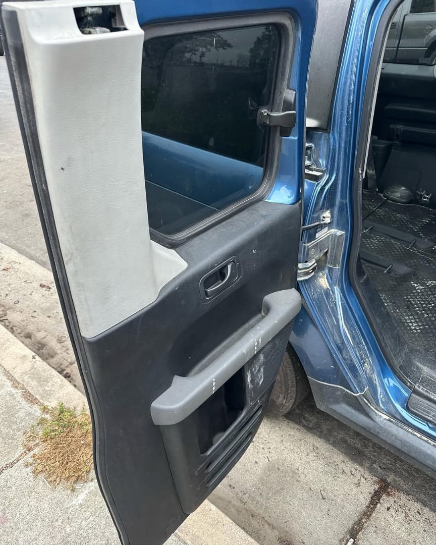 Honda Element door panel before detailing