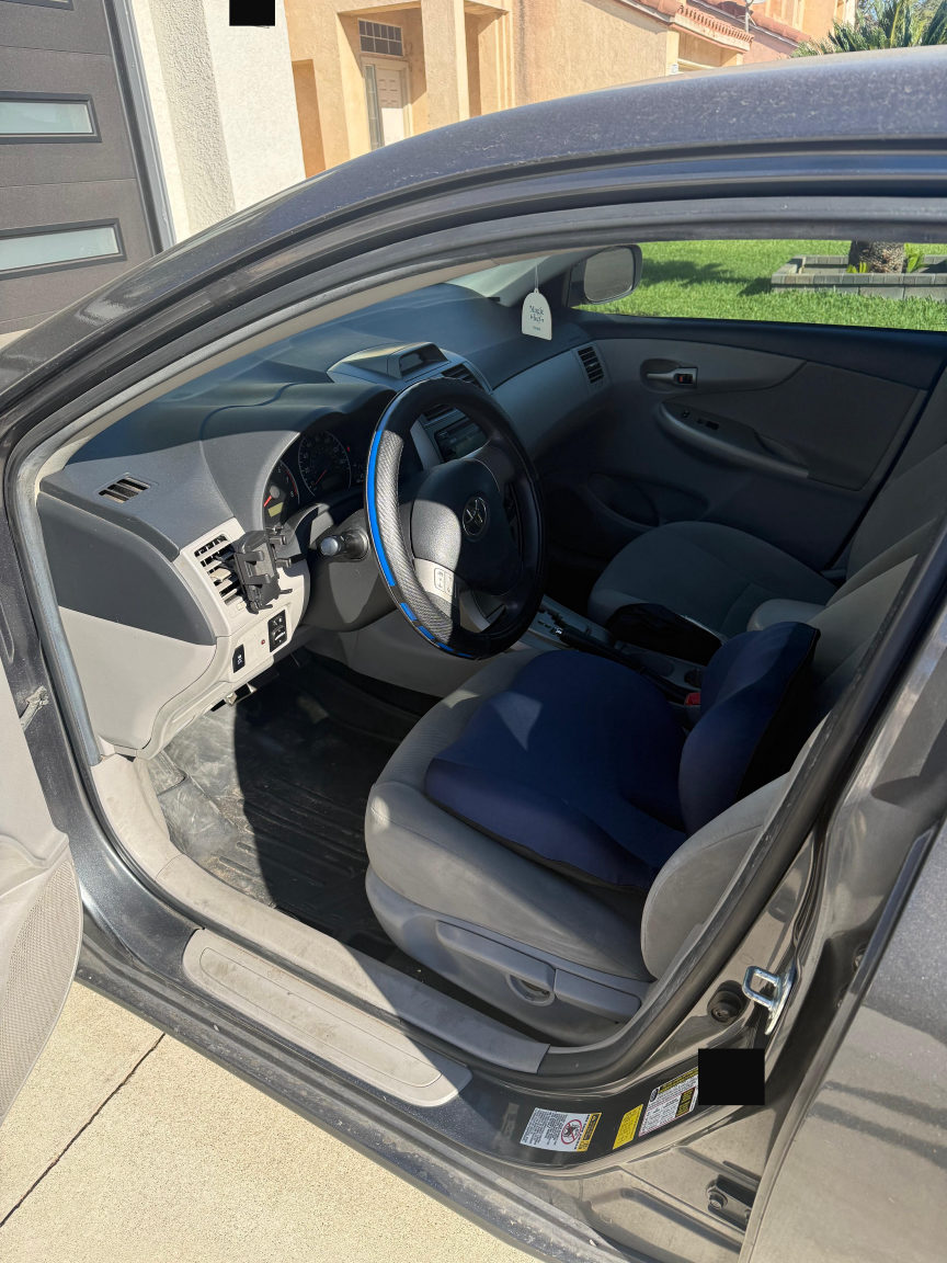 Toyota Corolla driver area before detailing