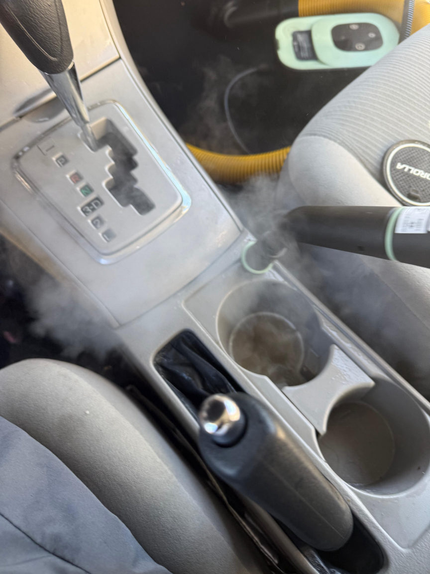 Toyota Corolla center console steam cleaning