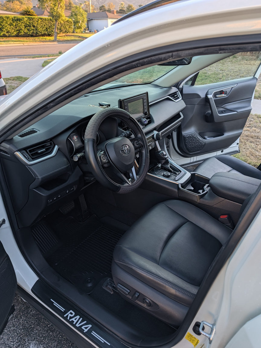 White Toyota RAV4 front interior after detailing