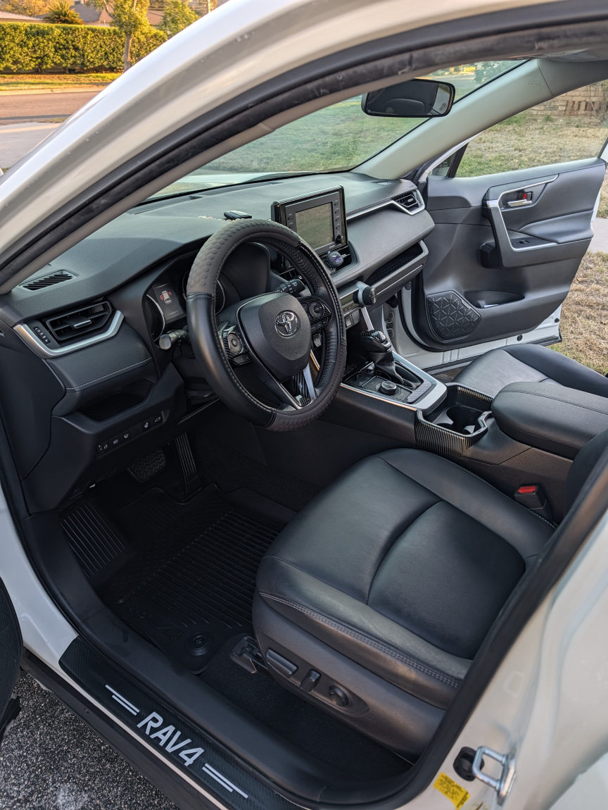 White Toyota RAV4 driver area after detailing
