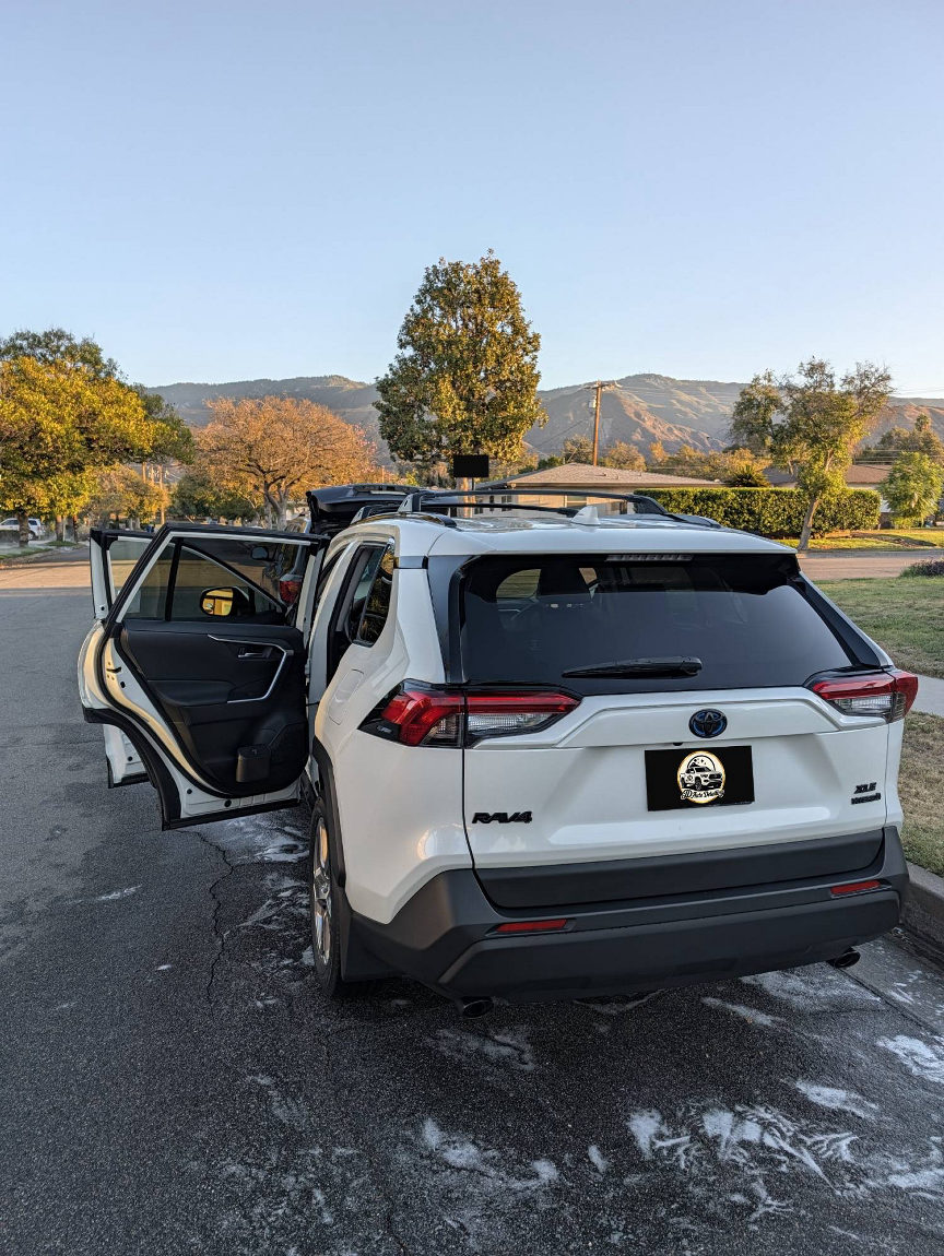 White Toyota RAV4 rear with doors open after detailing
