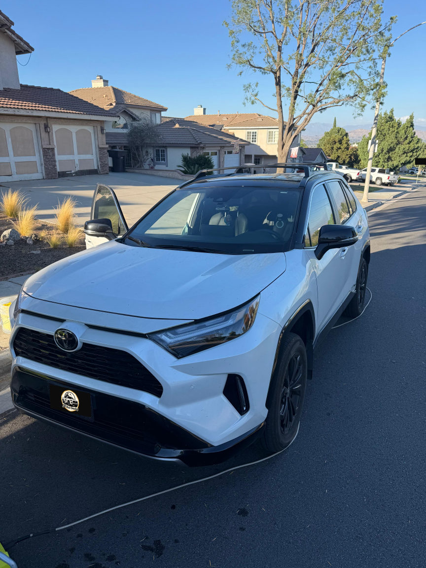 White Toyota RAV4 front before detailing