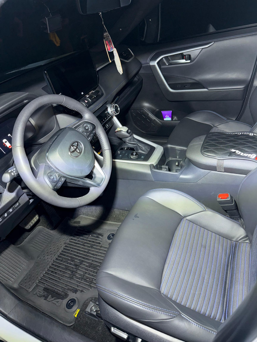 White Toyota RAV4 driver area after detailing